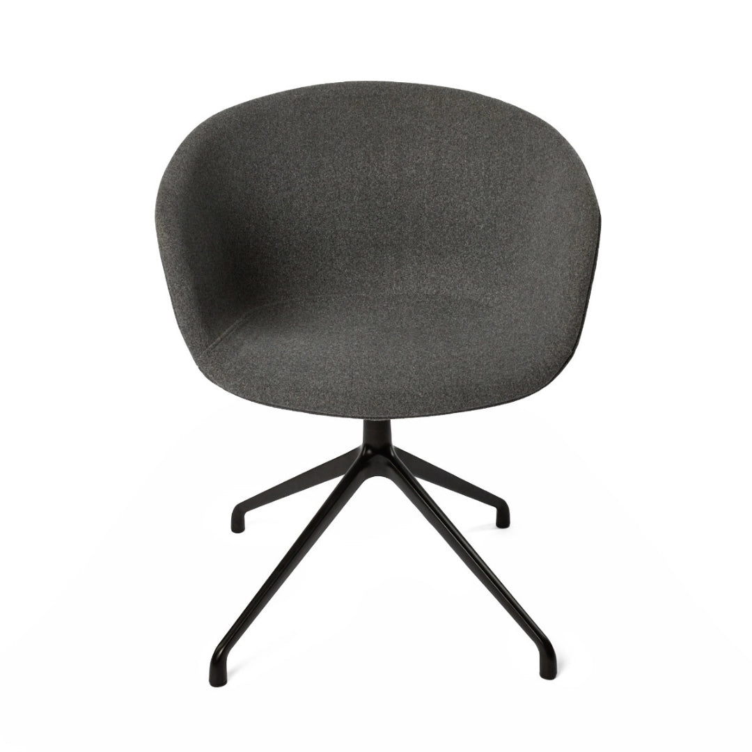 The product is a conference chair, characterized by its ergonomic design and modern aesthetic. It features a rounded, upholstered seat in a dark gray fabric, supported by a sleek black metal base with a four-legged design. The overall look is minimalist and stylish, suitable for office or conference settings.