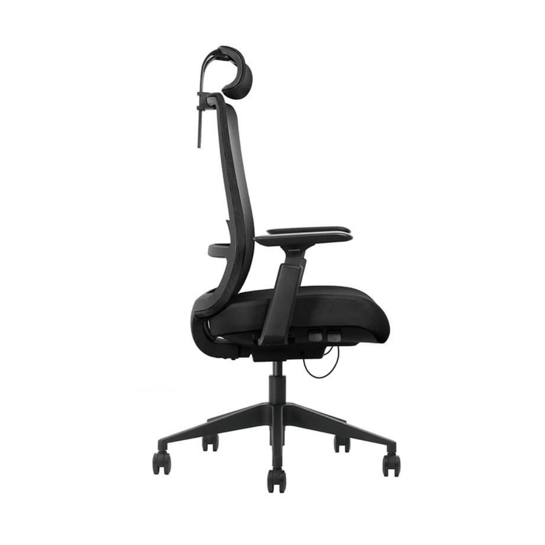The image features an ergonomic office chair, specifically the Vane model. It showcases a sleek black design with a high backrest, adjustable headrest, and armrests. The chair is mounted on a five-star base with wheels, indicating mobility and ease of movement.