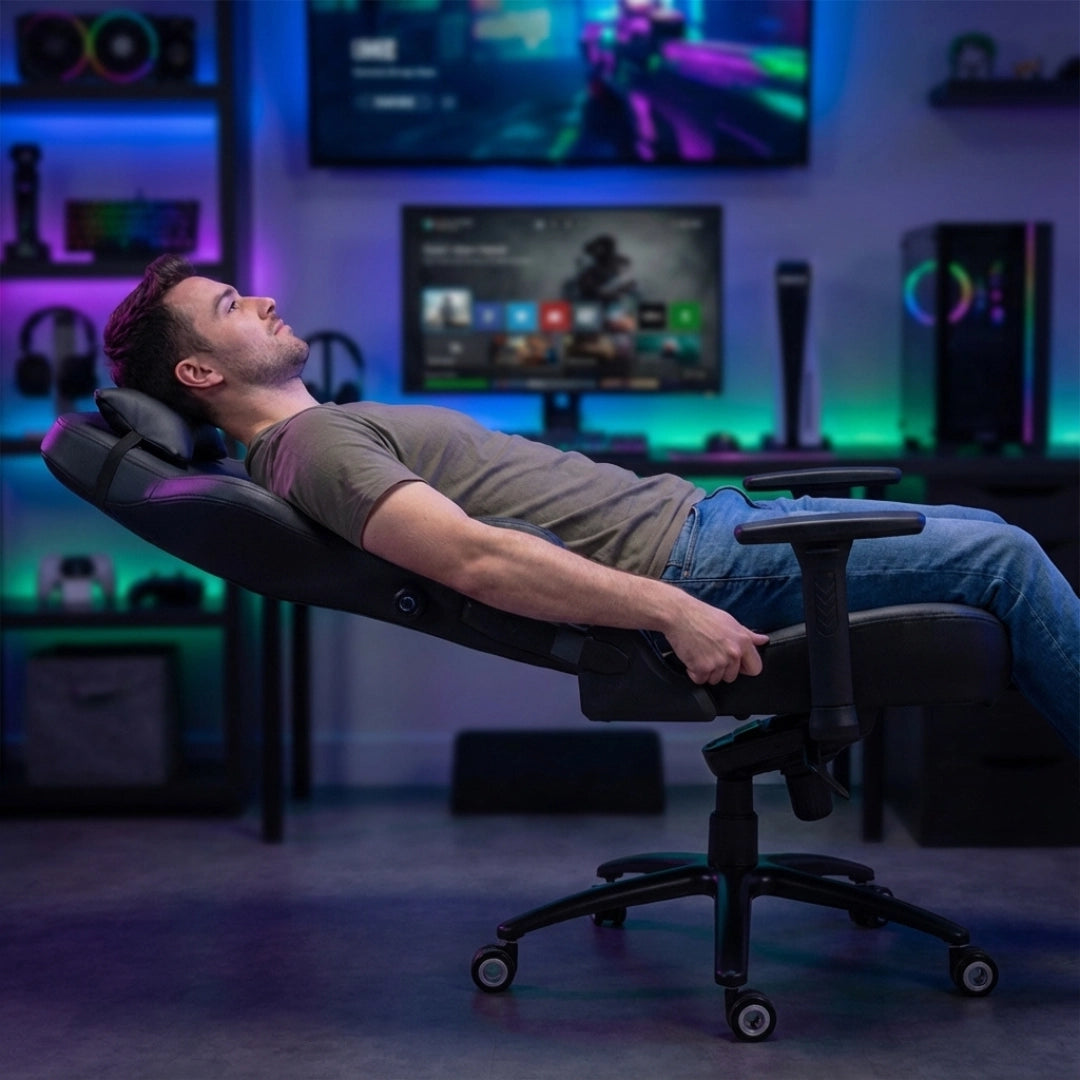 The image features an ergonomic office chair designed for comfort and support. It appears to be a model from the UVI brand, showcasing a user reclining in the chair. The setting includes a modern workspace with vibrant lighting and gaming equipment in the background, emphasizing a stylish and functional environment.