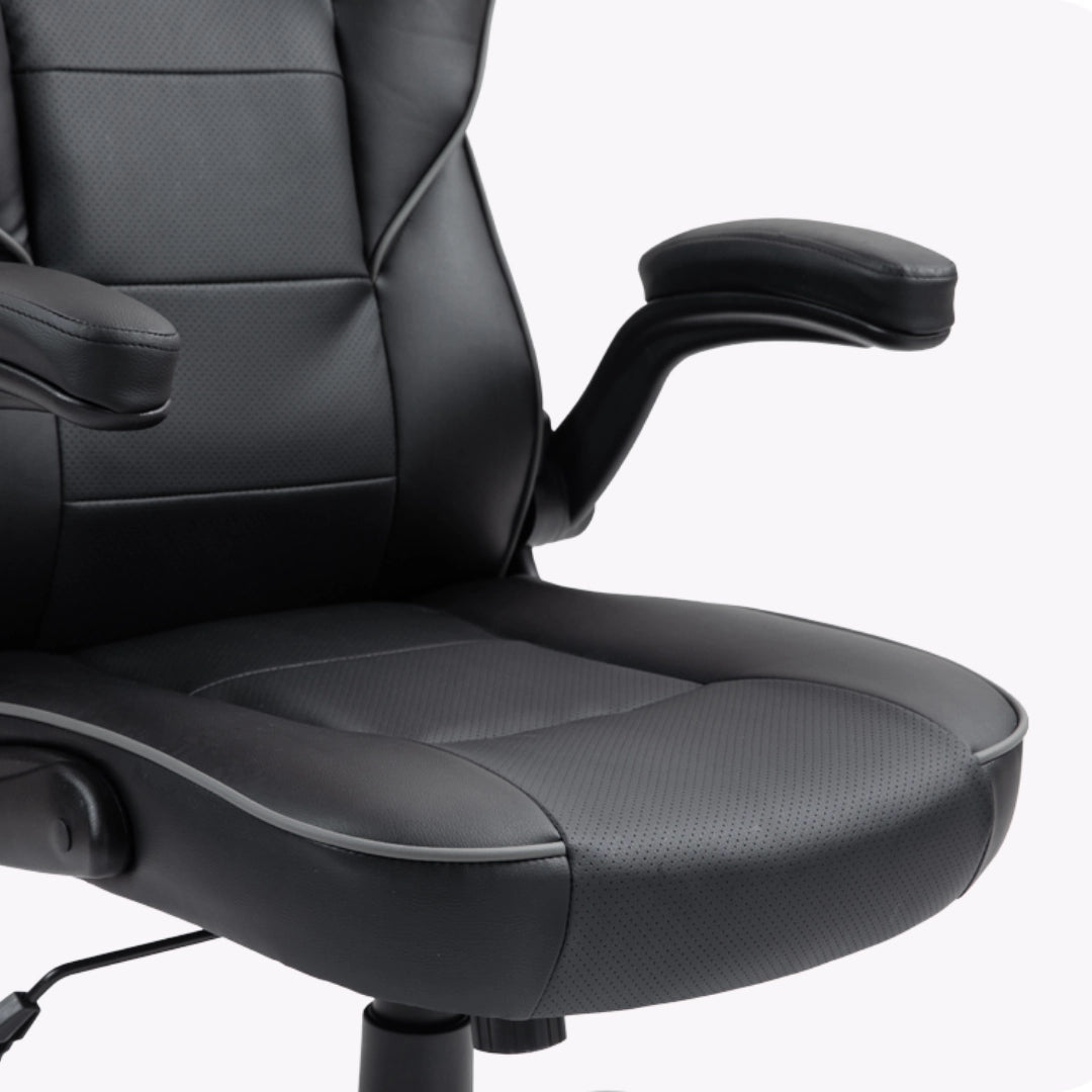 The product is an ergonomic office chair, specifically the UVI Simple Office model. The image shows a close-up view of the chair's seat and armrests, featuring a sleek black design with textured fabric and padding for comfort. The chair is designed to provide support during long hours of sitting.