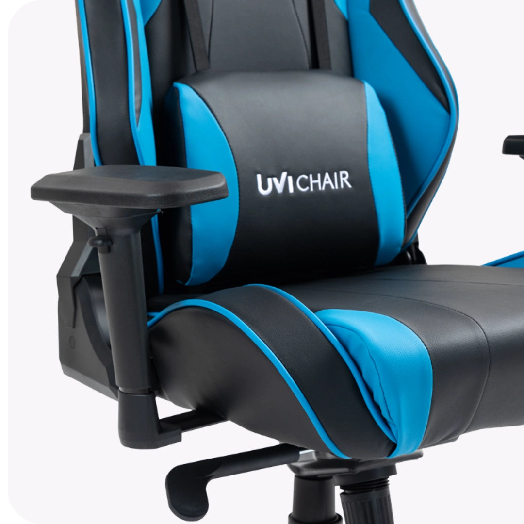 The product is an ergonomic gaming chair designed for comfort during long gaming sessions. It is branded as UviChair, model Uvi Sport XL in blue. The image shows the chair's padded seat and backrest, featuring a sleek design with blue and black color accents, along with adjustable armrests for added support.