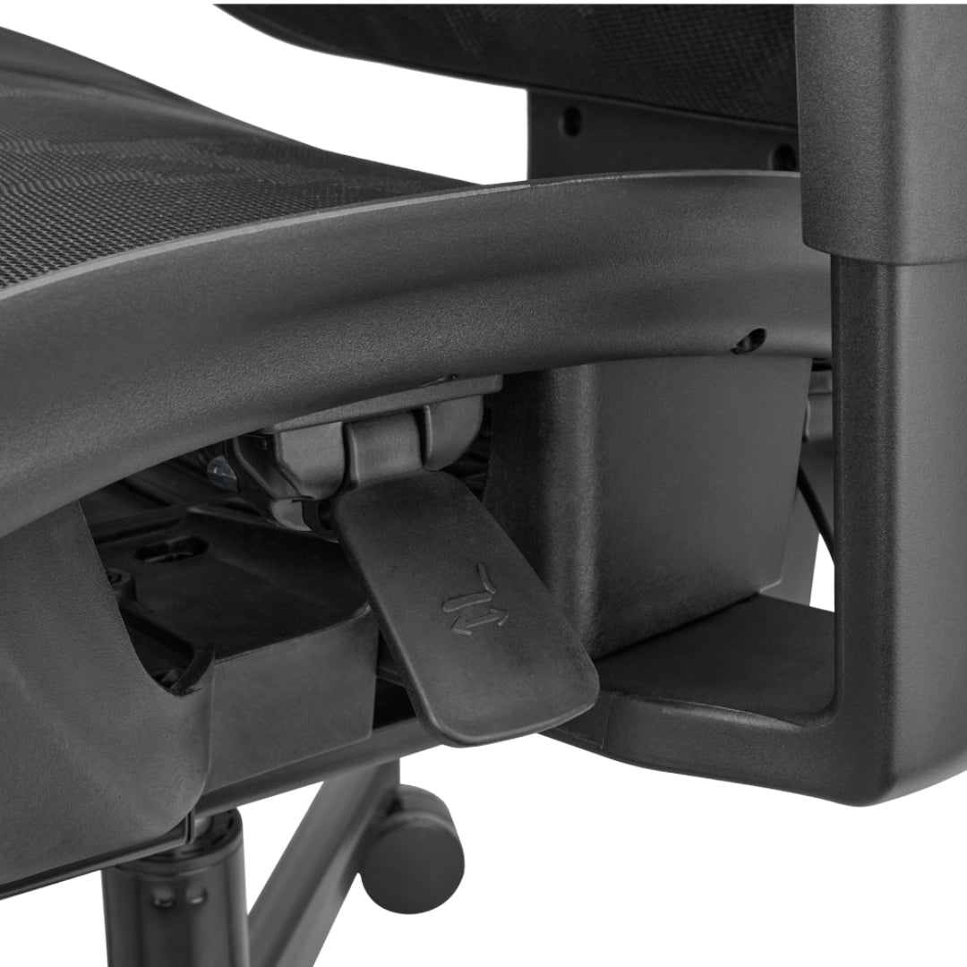 The product is an ergonomic office chair, specifically the UVI Focus Pro model. The image shows a close-up view of the chair's armrest and adjustment lever, highlighting its ergonomic design features. The materials appear to be durable, with a focus on comfort and functionality.