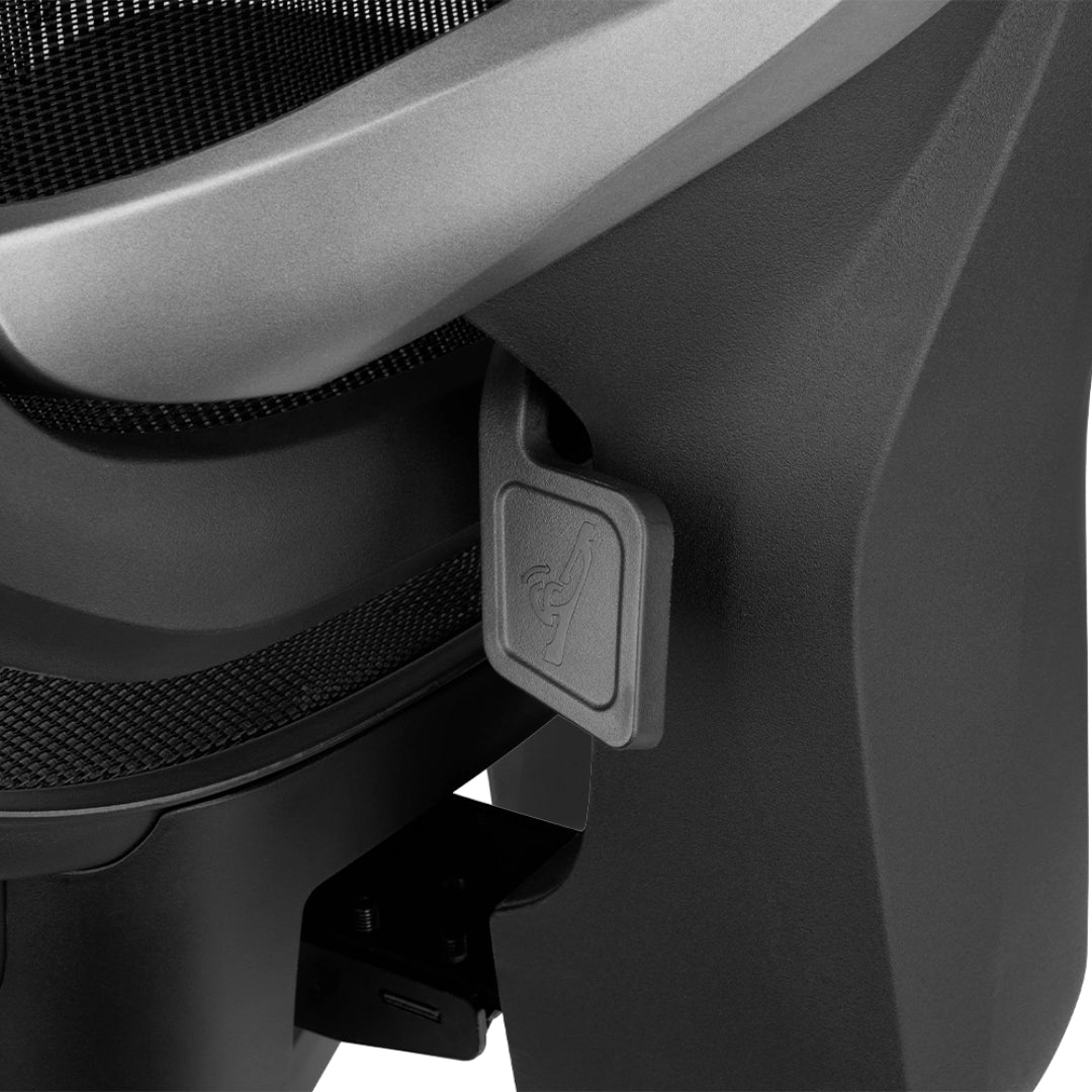 The product is an ergonomic office chair, specifically the UVI Focus Pro model. The image shows a close-up of the chair's armrest and a control mechanism, highlighting its sleek design and functional features. The materials appear to be durable, with a focus on comfort and adjustability.