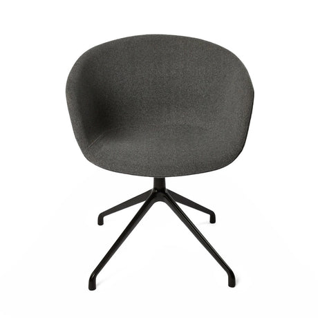 The product is a conference chair, characterized by its ergonomic design and modern aesthetic. It features a rounded, upholstered seat in a dark gray fabric, supported by a sleek black metal base with a four-legged design. The overall look is minimalist and stylish, suitable for office or conference settings.
