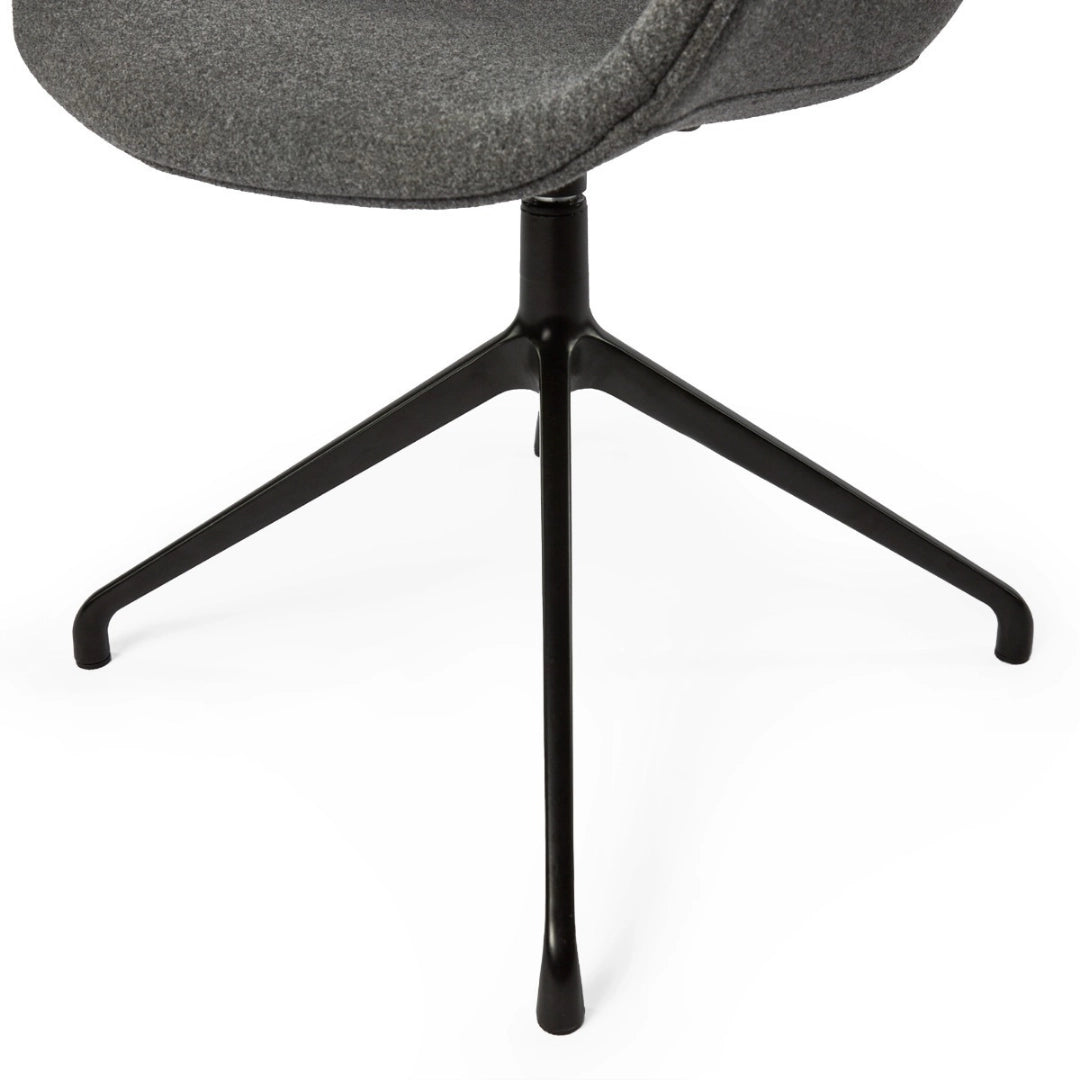 The image features an ergonomic office chair with a modern design. It has a gray fabric seat and a sleek black metal base with a three-legged design. The focus is on the chair's seat and part of the base, showcasing its contemporary aesthetic.