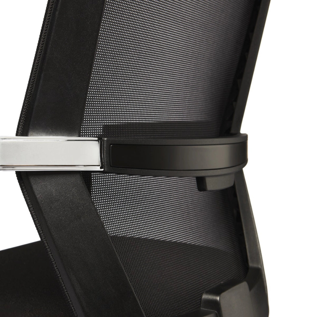 The product depicted is an ergonomic conference chair, designed for comfort during meetings and long periods of sitting. The image shows a close-up of the chair's mesh backrest and armrest, highlighting its modern design and breathable material for enhanced support. The chair features a sleek black frame with a chrome accent on the armrest.