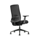 The product is an ergonomic office chair, specifically the Vane model. The image shows the back view of the chair, featuring a mesh backrest for breathability, adjustable armrests, and a five-point base with wheels for mobility. The overall design emphasizes comfort and support for long hours of sitting.