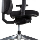 The product is an ergonomic office chair, likely designed for comfort and support during long hours of sitting. The image shows a side view of the chair, highlighting its adjustable armrest, seat, and a chrome base. The fabric appears to be black, suggesting a professional look suitable for office environments.