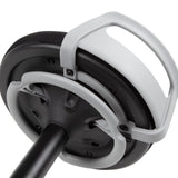 The product depicted is a sit-stand stool designed for ergonomic use, promoting active sitting and balance. The image shows the underside of the stool, highlighting a sturdy base with a handle for easy maneuverability. The design emphasizes functionality and comfort, suitable for modern office environments.