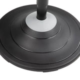 The image shows a base of a sit-stand stool designed for ergonomic office use. It features a circular, layered design in black and gray, providing stability and support. The stool is intended to promote active sitting and balance while allowing users to alternate between sitting and standing positions.