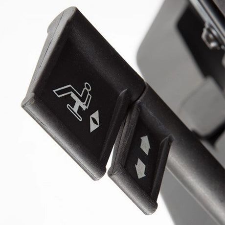 The product is an ergonomic office chair, specifically the "Ergonomic Office Chair Basic." The image shows the control levers for adjusting the chair's features, including a reclining mechanism and height adjustment, indicated by relevant symbols. The design is practical, focusing on user comfort and functionality.