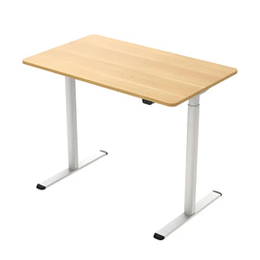 The product is a standing desk, likely designed for ergonomic use. It features a simple design with a wooden tabletop and metal legs, showcasing a modern aesthetic. The desk appears to have an adjustable height mechanism, making it suitable for both sitting and standing work positions.