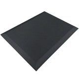 The image shows an ergonomic anti-fatigue mat, designed to provide comfort and support for individuals who stand for extended periods. The mat features a textured surface and beveled edges for safety, and it is predominantly black in color. This type of product is commonly used in offices, kitchens, and workspaces to reduce fatigue and improve posture.