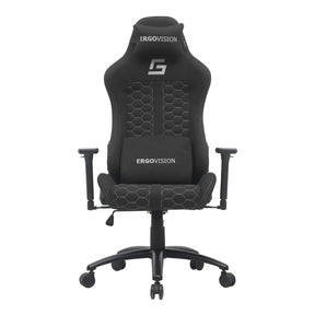 The product is an ergonomic gaming chair, specifically the Mikado model by Ergovision. The chair features a sleek design with a black fabric finish and hexagonal patterns on the backrest and seat. It includes adjustable armrests and a supportive headrest, making it suitable for long gaming or office sessions.