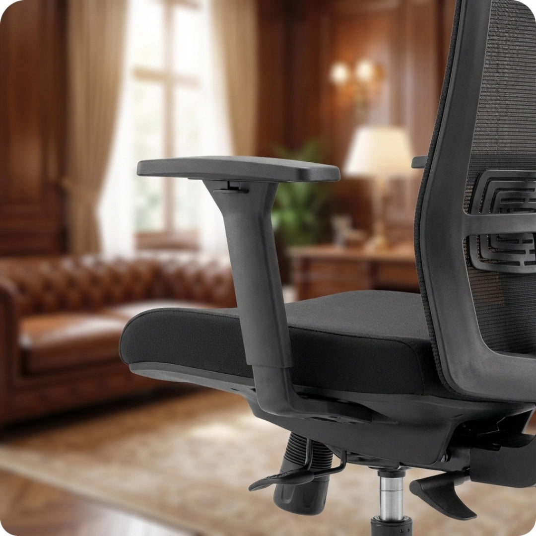 The product is an ergonomic office chair, specifically the UVI Energetic model. The image shows a close-up of the chair's armrest and seat, highlighting its sleek design and adjustable features. The background suggests a sophisticated office environment with a cozy sofa and elegant decor.