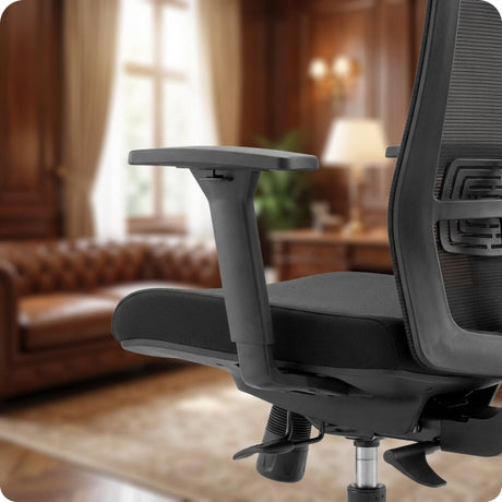 The product is an ergonomic office chair, specifically the UVI Energetic model. The image shows a close-up of the chair's armrest and seat, highlighting its sleek design and adjustable features. The background suggests a sophisticated office environment with a cozy sofa and elegant decor.