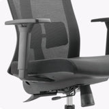 The product is an ergonomic office chair, specifically the UVI Energetic model. The image shows a close-up view of the chair's backrest and armrest, featuring a mesh design for breathability, a cushioned seat, and adjustable components for enhanced comfort.