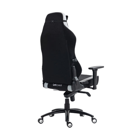 The product is an ergonomic office chair designed for gaming, specifically the UVI Alpha model. The image shows the chair from the side, highlighting its tall backrest, adjustable armrests, and a sleek, modern design with a combination of black and gray materials. The chair is mounted on a five-point base with wheels for mobility.