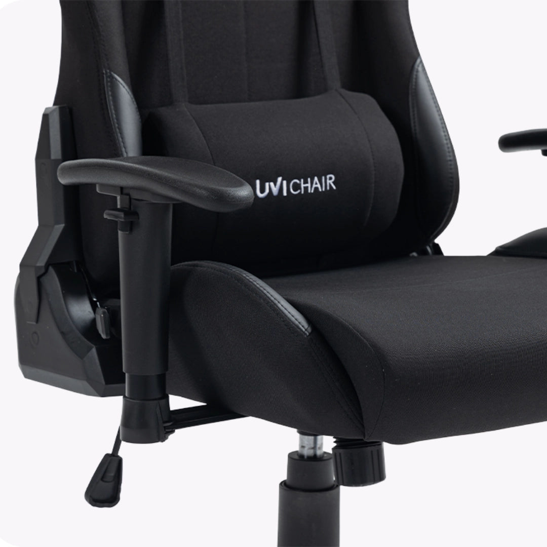 The product is an ergonomic office chair designed for gaming, specifically the UVI Chair model in black. The image showcases the chair's sleek design, featuring a padded seat and backrest for comfort, adjustable armrests, and a sturdy base, all in a sophisticated black fabric.