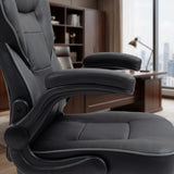 The product is an ergonomic office chair, specifically the UVI Simple Office model. The image shows a close-up of the chair, highlighting its plush seat and armrests, designed for comfort and support. The background features a modern office setting with wooden furniture and a large window, suggesting a professional environment.