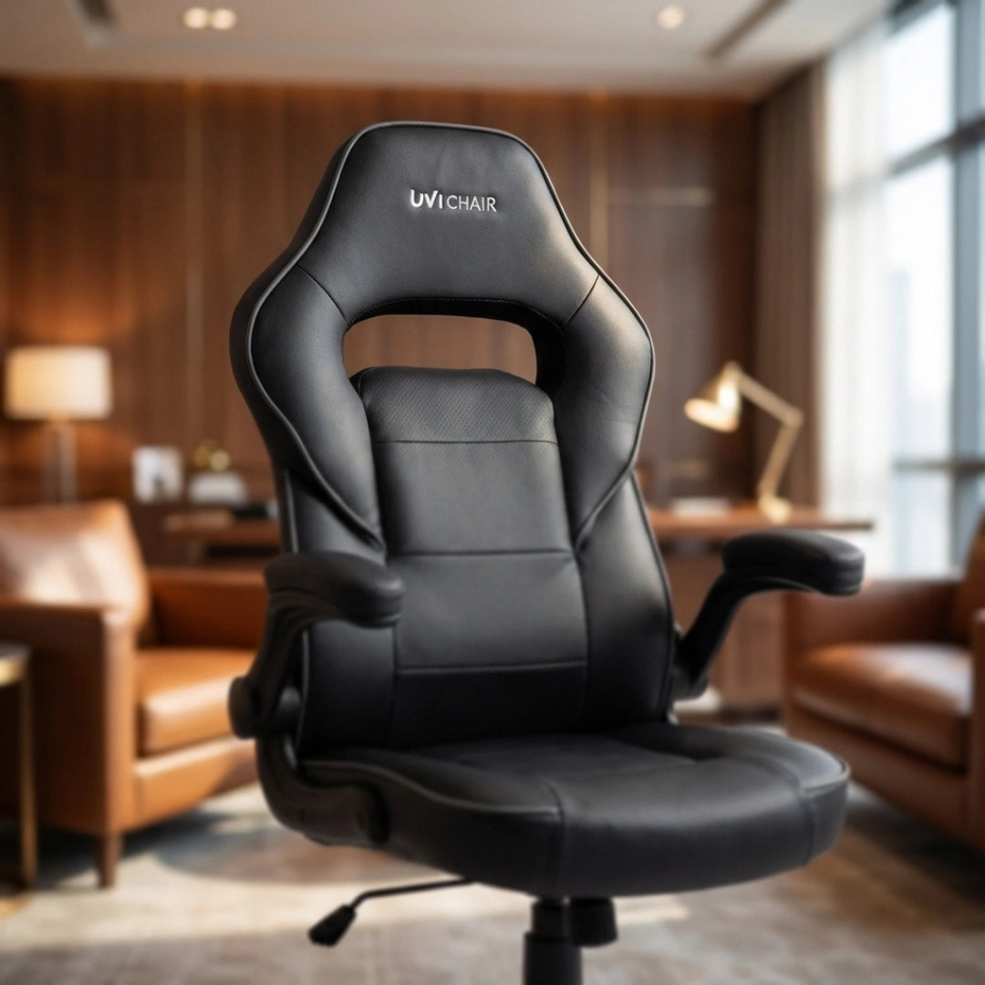 The image features an ergonomic office chair from the brand UVI, specifically the UVI CHAIR model. The chair is designed with a sleek black finish and includes a high backrest with pronounced support contours, making it suitable for comfortable long-term use in an office setting. The background suggests a modern office environment with wooden accents and soft lighting.