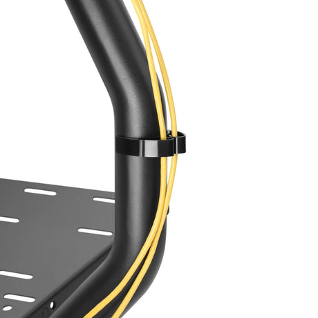 The image features a component of the UVI Racing Seat Pro V2, which is a racing simulator seat designed for gaming enthusiasts. The visible part shows a black metal frame with a curved section and cable management clips holding yellow cables, indicating a focus on organization and aesthetics in the design.